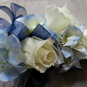 White Roses Blue Tinted Accents Corsage