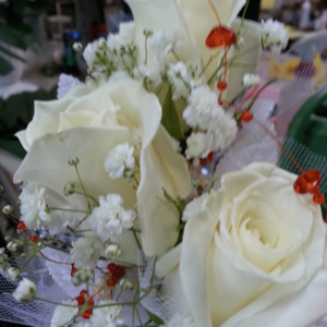 White Roses Baby's Breath Red Beads Corsage