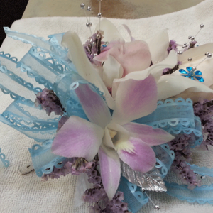 Purple tinted Orchid & Lily of the Valley Baby Blue Ribbon Corsage