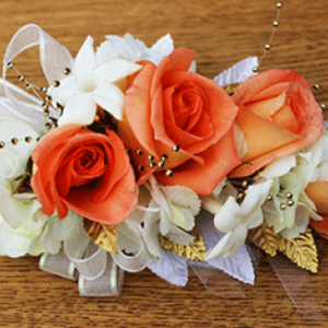 5 Orange Roses Stephanotis Corsage
